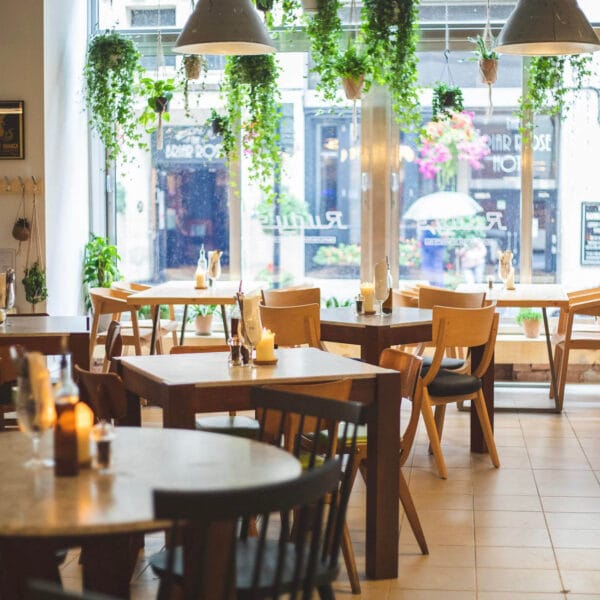 Interior seating and dining area at Rudy’s Pizza with casual tables and relaxed atmosphere