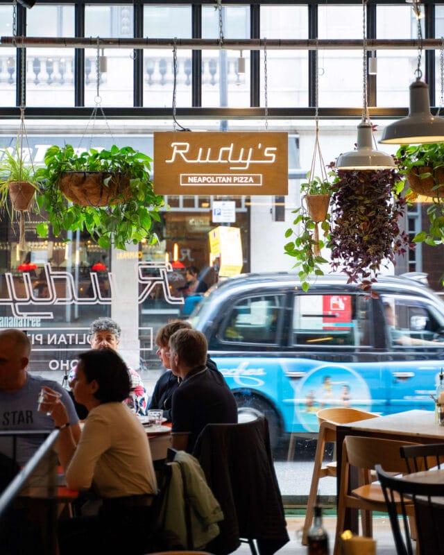 Interior of Rudy’s Soho showing casual seating and relaxed dining space