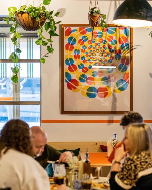 Rudy's Brindley place relaxed and friendly atmosphere where people are enjoying tasty Neopolitan pizza