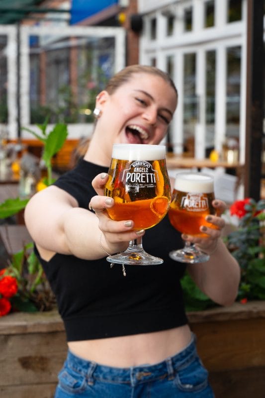 happy person holding drinks