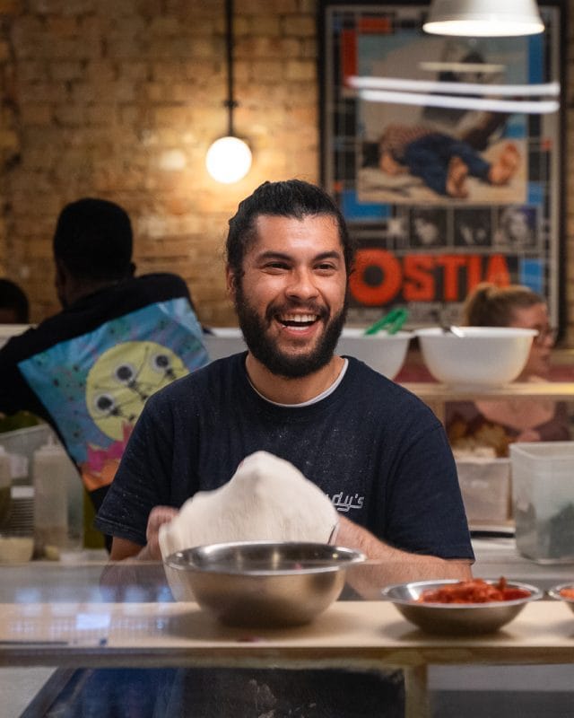 pizzaioli preparing dough