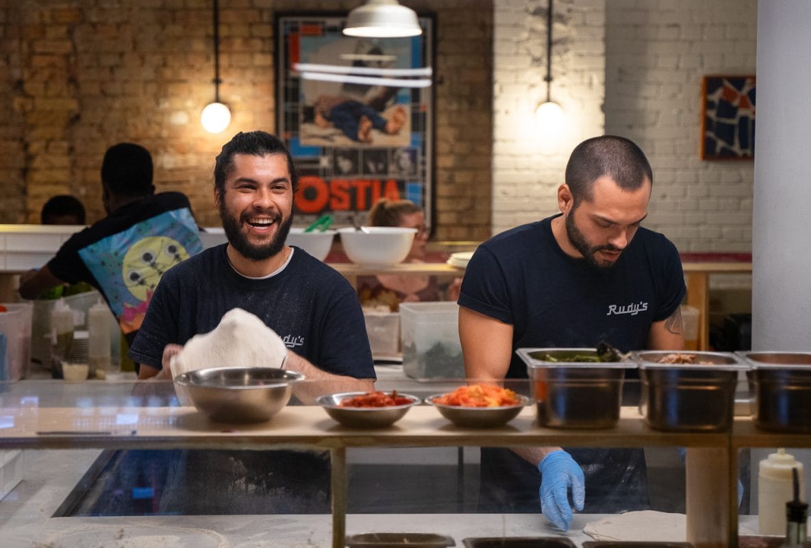 staff preparing dough of napoli style pizza