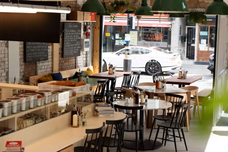 Exterior of Rudy’s Pizza Queensway restaurant in London.