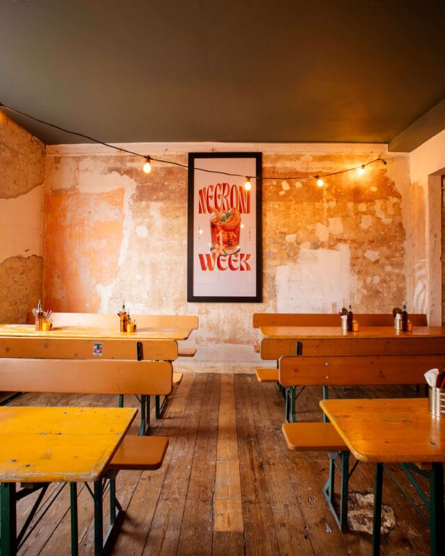 Private dining room at Rudy’s Cambridge, The Store, a stylish upstairs space for up to 70 guests enjoying authentic Neapolitan pizza