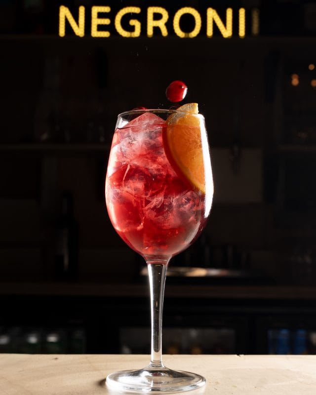 Malfy gin, spiced red berry syrup, prosecco and soda
