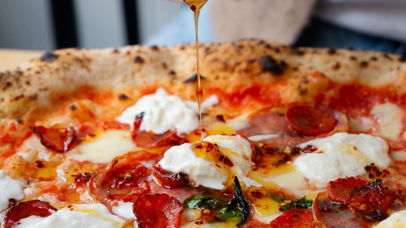 pizza with cheese pepperoni and chilli oil